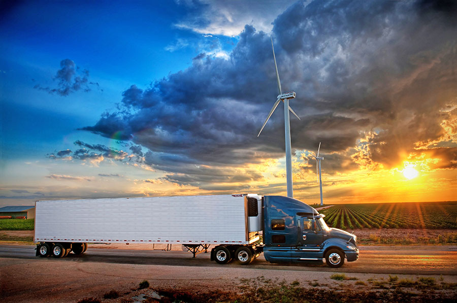 Truck Driving Down Road